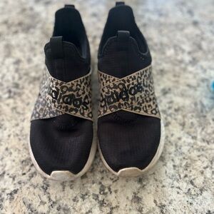 Adidas women’s Black and Leopard Slip-On tennis shoe